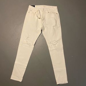 Men’s lightly worn Abercrombie distressed white slim denim.